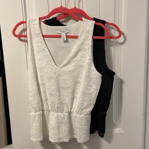 2 sleeveless tops from WHBM. 1 black and 1 white.